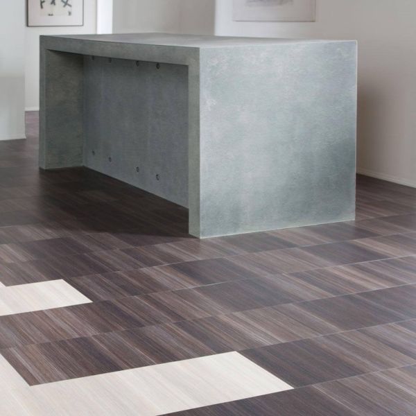 A kitchen unit set atop brown Amtico LVT flooring